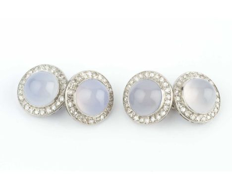 A pair of chalcedony and diamond cufflinks, each circular cabochon chalcedony bordered by single-cut diamonds, white precious