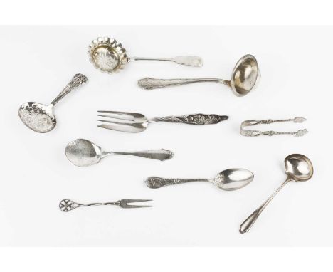 A 19th century German silver sifter spoon, Hamburg circa 1860, another German sauce ladle, stamped 800, together with assorte