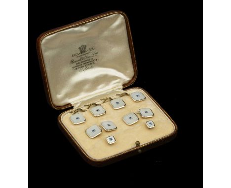 A gentleman's dress set, comprising a pair of cufflinks, four buttons and two dress studs, each octagonal chequerboard mother