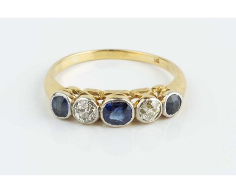 A sapphire and diamond five stone ring, the alternate cushion-shaped sapphires and old-cut diamonds in millegrain collet sett