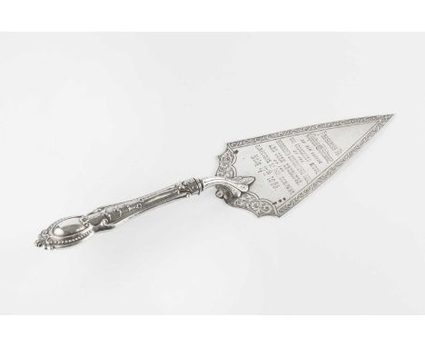 A mid Victorian silver presentation trowel, with foliate engraved decoration, presentation inscription for the laying of the 
