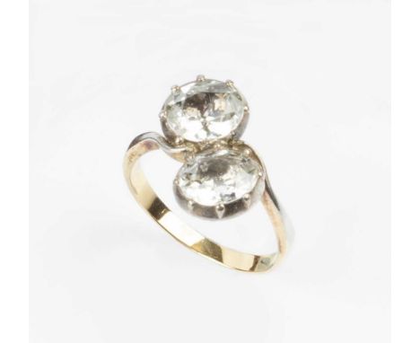 A collection of antique and later jewellery, comprising a white sapphire two stone crossover ring, the oval mixed-cut sapphir