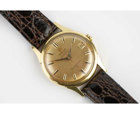 A 'Constellation' automatic wristwatch by Omega, the circular gilt dial with black baton markers, date display and centre sec