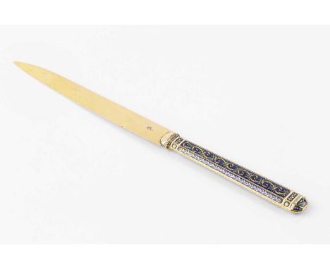 An early 19th century Swiss gold and enamel letter opener, the faceted handle finely decorated with scrolling foliage in gilt