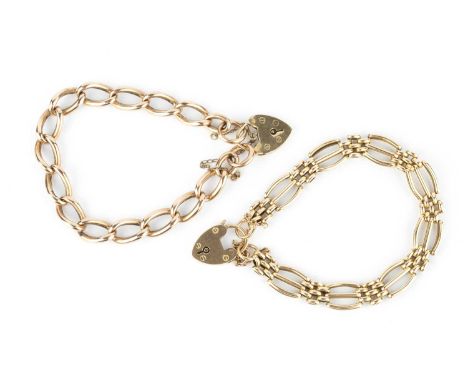 A fancy gate-link bracelet, stamped '15C', with 15ct gold padlock clasp, and a curb-link bracelet, stamped '9 .375', with lat