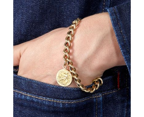 BRACELET GOURMETTE ET MEDAILLE La médaille en or 18K représente Alexandre Le Grand en Zeus-Ammon et la déesse Athéna au rever