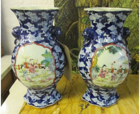 CHINESE VASES, a pair, 21st century Oriental blue and white ceramic, each 33cm H. (2)