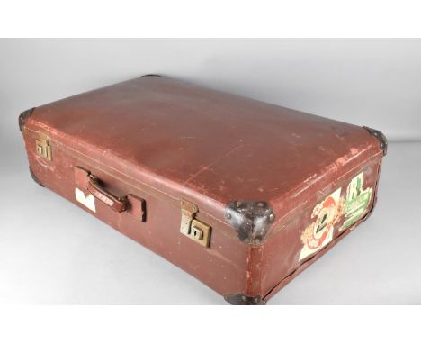 A Vintage Travelling Trunk with Vintage Cabin Luggage Stickers etc, 73cm wide 