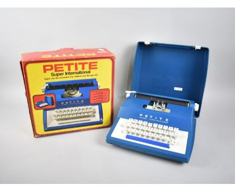 A Vintage Boxed Petite Super International Toy Typewriter, Original Box 