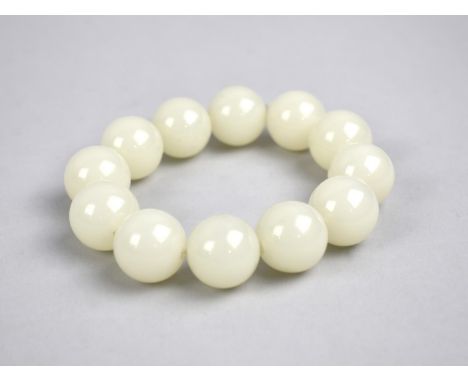 A Jade Type Twelve Bead Bracelet 