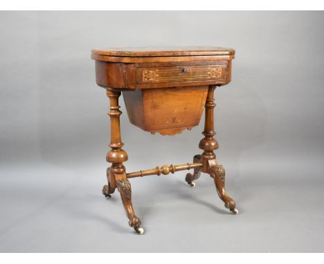 A Late Victorian Inlaid Walnut Lift and Twist Top Games Work Table with Pull Out Wool Slide, Inner Surface inlaid for Backgam