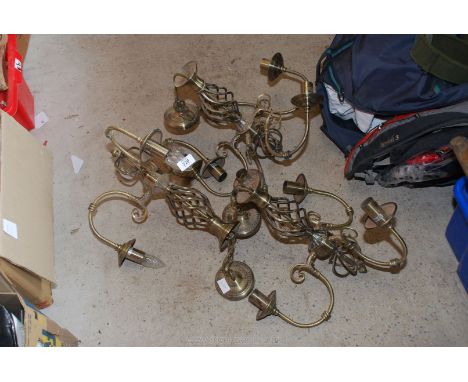 Three brass effect chandelier electric lights.