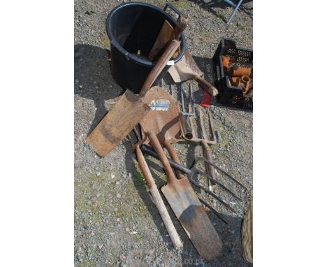 A quantity of garden tools - stainless steel forks, shovels, spades, etc, all lacking handles.