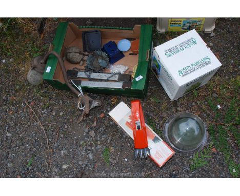 A garden ornament, pot mover, Sandvik glass shears, plant dome, outside light, etc.
