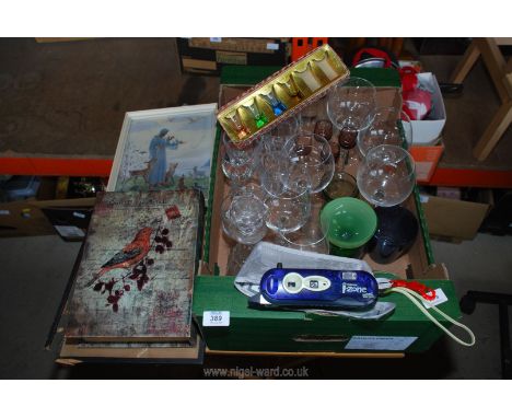 A box of miscellanea including glasses, bird book, Polaroid camera etc.