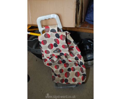 A foot rest, collapsible stool, ladder brace, shopping trolley etc.