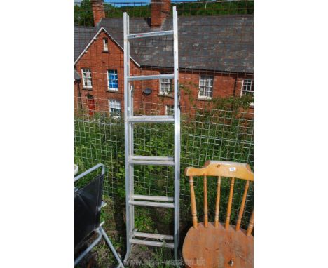A double opening metal ladder.