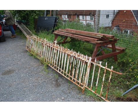 Two lengths of railing, 131'' and 135'' long x 25'' high.