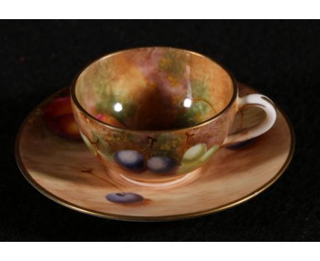 Royal Worcester miniature cabinet cup and saucer decorated with peaches and blueberries within a gilt border, 3cm CONDITION R