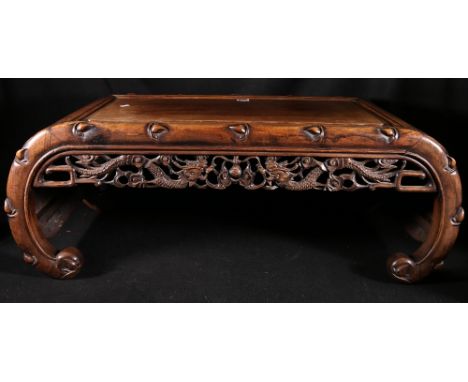 Chinese carved coffee table with carved scroll supports and pierced and carved frieze, 91 x 44cm.