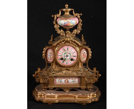 Marti & Co., gilt spelter mantel clock set with painted porcelain panels and dial, 38cm tall