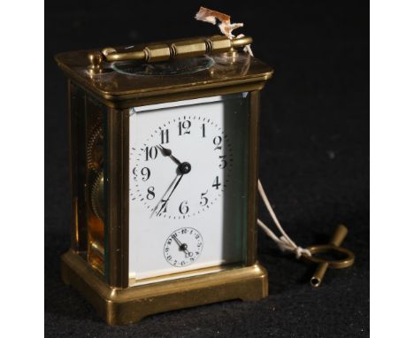 French brass carriage clock with enamel Arabic dial, having alarm indicator, the cylinder movement striking on a bell.