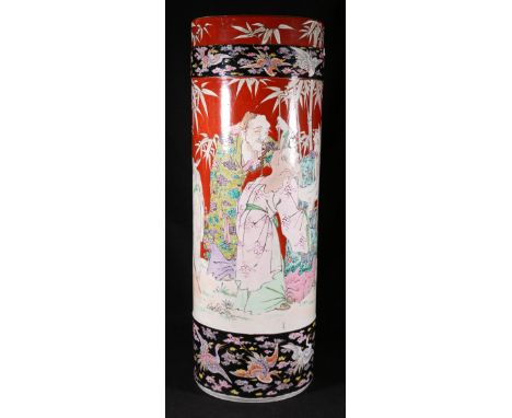 Large Japanese Arita ware stick stand decorated with an elaborate figure panel on a red ground and two black bands of cranes,