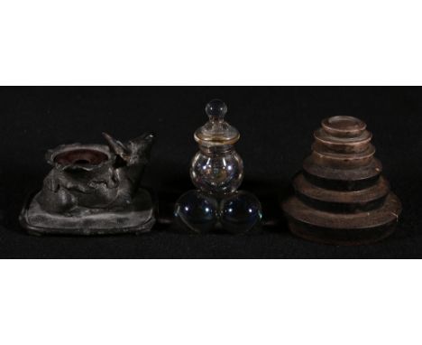 Silver and iron inkwell by A C & Co in the form of a stack of six weights, 9cm, another cast metal in the form of an oxen, 10