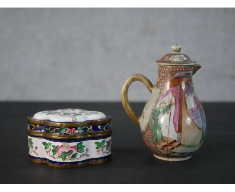 An 18th century Chinese export porcelain covered pitcher decorated with courtiers within a interior scene along with a Chines