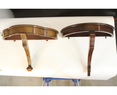 Two 20th century console tables, one demi lune mahogany with a reeded edge, on a scrolling support, the other yew wood, with 