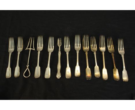 A collection of thirteen silver forks, including a silver crumpet fork, a silver pickle fork, three Exeter Victorian forks, a
