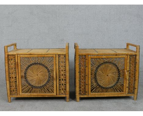 A pair of vintage woven rattan bedside cabinets. H.66 W.73 D.41cm 