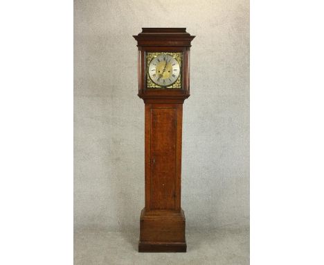 A 19th century oak longcase clock, eight day movement, the silvered chapter ring with Roman and Arabic numerals and pierced b