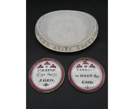An antique gilded 'Give Us This Day Our Daily Bread' ceramic plate along with two Maling style pottery wall plaques to includ
