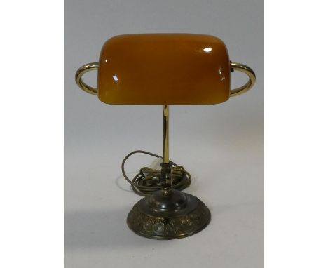 A Christopher Wray vintage style embossed brass desk lamp with amber glass shade. H.38cm 