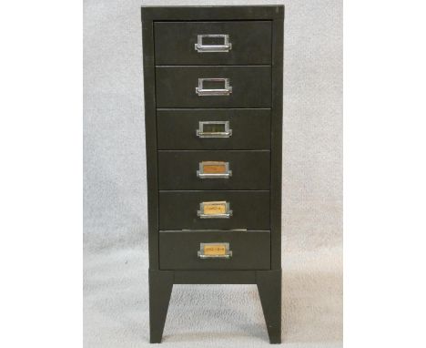 A vintage metal A4 filing cabinet along with an extensive collection of scientific and photographic slides. H.73 W.29 D.39cm 