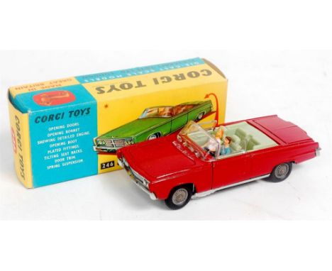 Corgi Toys, 246 Chrysler Imperial convertible, deep red body with light blue interior, with driver figure, passenger and golf