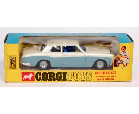 Corgi Toys, 273 Rolls Royce Silver Shadow, with golden jacks, pearlescent white upper, grey lower, blue interior, with model 