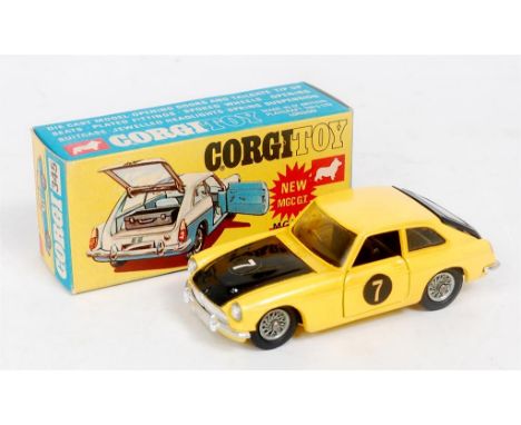 Corgi Toys, 345 MGC GT competition model, yellow body, black bonnet, tailgate and interior, spoked wheels, black suitcase, Ra