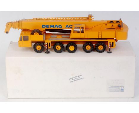 Conrad No.2081 1/50th scale diecast model of a Demag AC335 All Terrain Mobile Crane, yellow example with Demag livery, in the