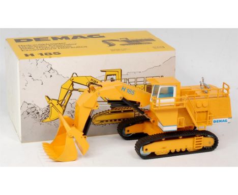 NZG 1/50th scale No.241 model of a Demag H185 Hydraulic Excavator, finished in yellow with Demag transfers, in the original p