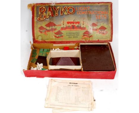 Bayko, pre-war light constructional set, circa.1937, No.1 with brownish-maroon base and roof, missing 1 red corner, 1 window,