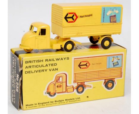 Budgie Toys, No.238 Scammell Scarab van, yellow body and trailer, black tyres with 'Rail Freight' and 'Cadbury's' transfers, 