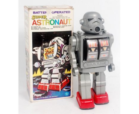 Hong Kong Toys (HK) plastic and battery operated Super Astronaut Robot, grey plastic body, with red plastic feet, opening che