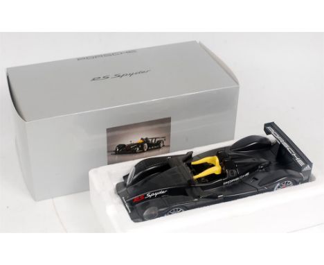 Auto Art Models 1/18th scale model of a Porsche RS Spyder, finished in black with Adidas Advertising, in the original polysty