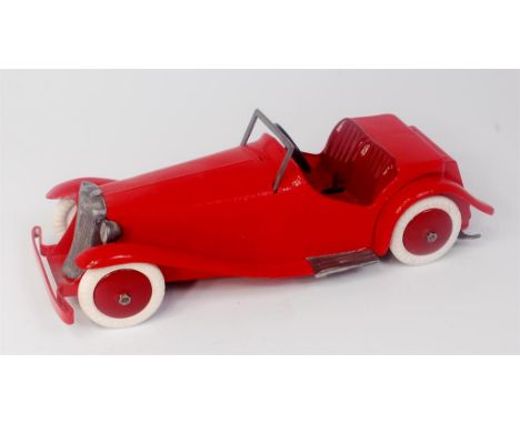 Meccano repainted and restored Non Constructor Car, finished in red with red hubs and white tyres, clockwork example with key
