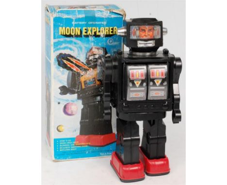 Hong Kong Issue, plastic and battery operated "Moon Explorer" Robot, black body with red feet, with clear visor, and opening 