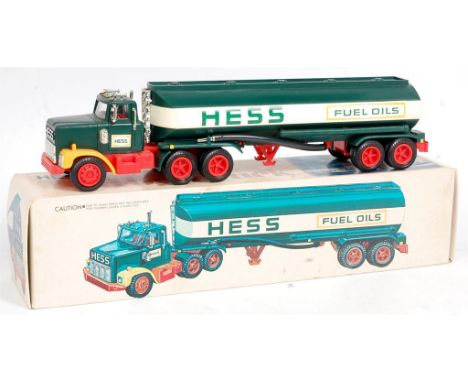 Hess, Hong Kong, plastic and battery operated model of a Gasoline Tanker, finished in green, red and yellow, in the original 