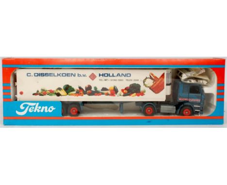 Tekno 1/50th scale model of a Scania 143M Artic with Refrigerated Trailer, finished in dark blue with red hubs, and white Fri