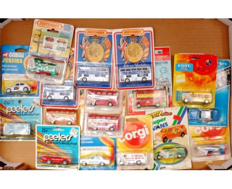 Corgi Juniors, Peelers, Matchbox, ERTL, and LJN Toys carded diecast group, 17 examples, some window split, some crushed and s